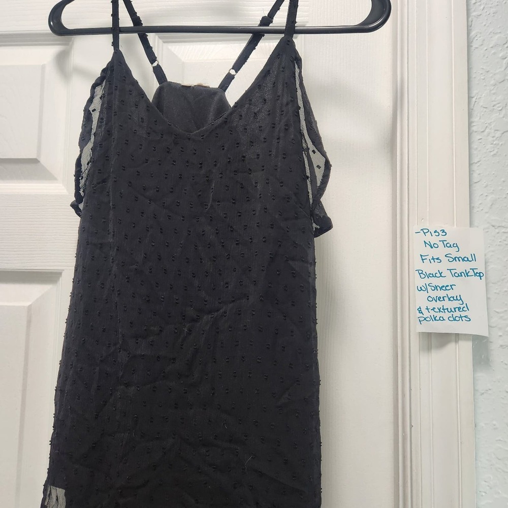 Black polka dot top